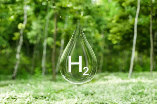istockphoto-1849134035-612x612 Close-up View Of Hydrogen Drop With Blurred Forest Background